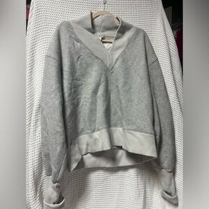 Gray V-neck sweater